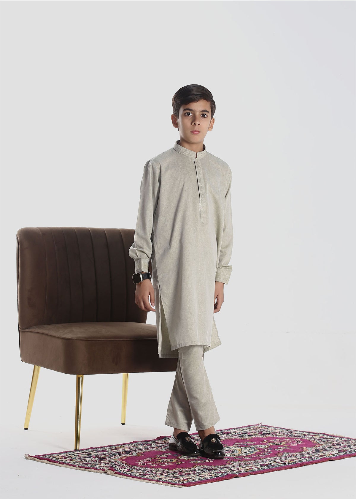 "Traditional boys’ kurta and trouser set for ages 3–14, featuring a long-sleeved kurta with a straight cut and matching trousers, ideal for festive and cultural occasions."